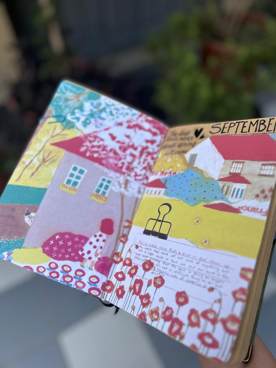 A close look at the handmade September collage and its layers of real paper